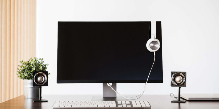 Modern Desktop Setup and White Headphones
